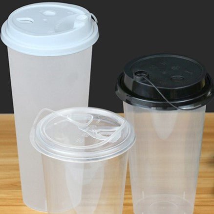 http://www.cokmaster.com/cdn/shop/products/1000pcs-354in9cm-disposable-milk-tea-cup-lid-leak-proof-cup-cover-juice-drink-packaging-cup-lid-223197.jpg?v=1677271999